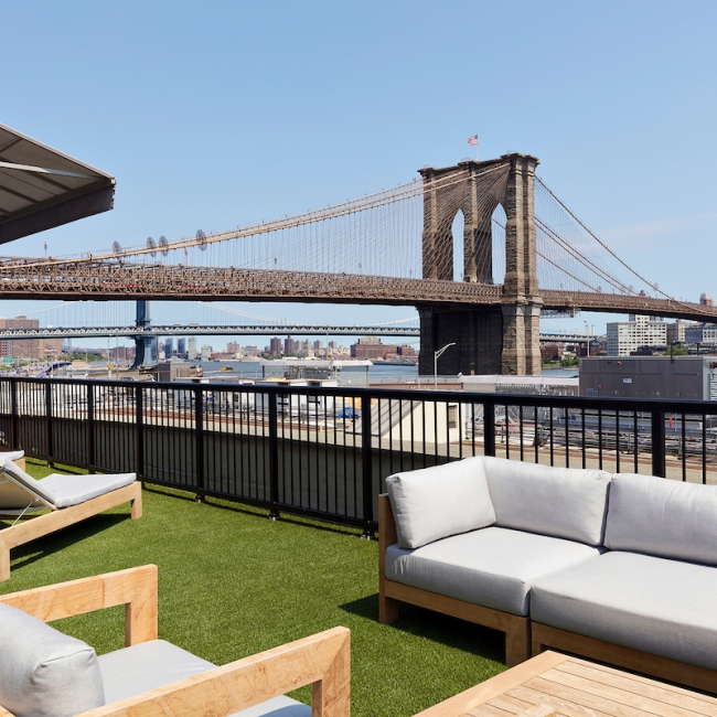 large private terrace overlooking the Brooklyn Bridge